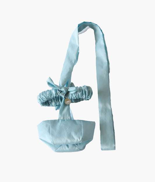 Crossbody bottle bag in baby blue